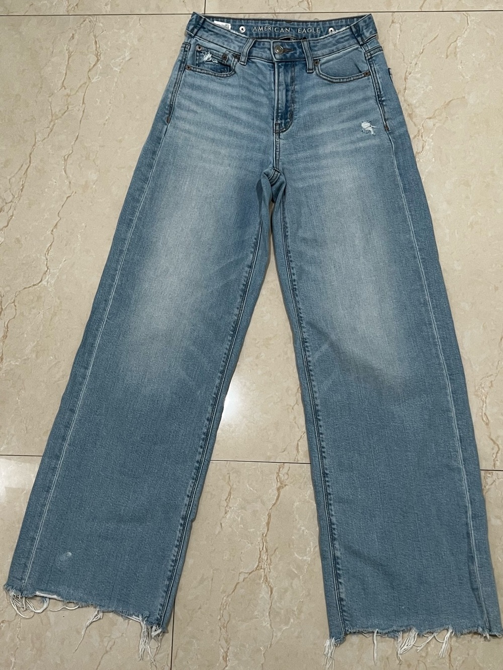 American Eagle Outfitters Light Blue Wide-Leg Jeans with Raw Hem